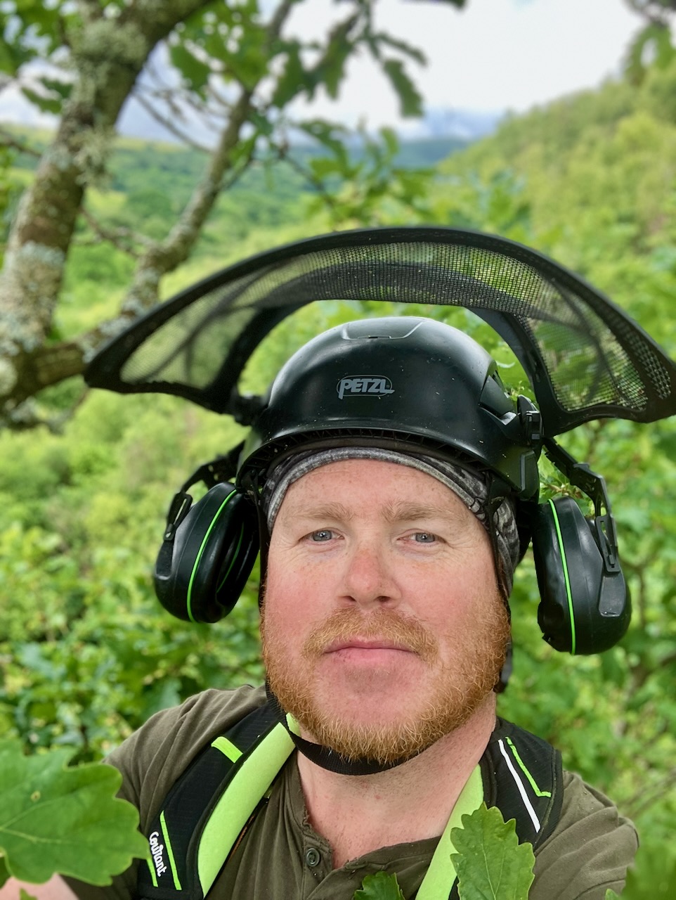 Arborist talking with a client in the garden